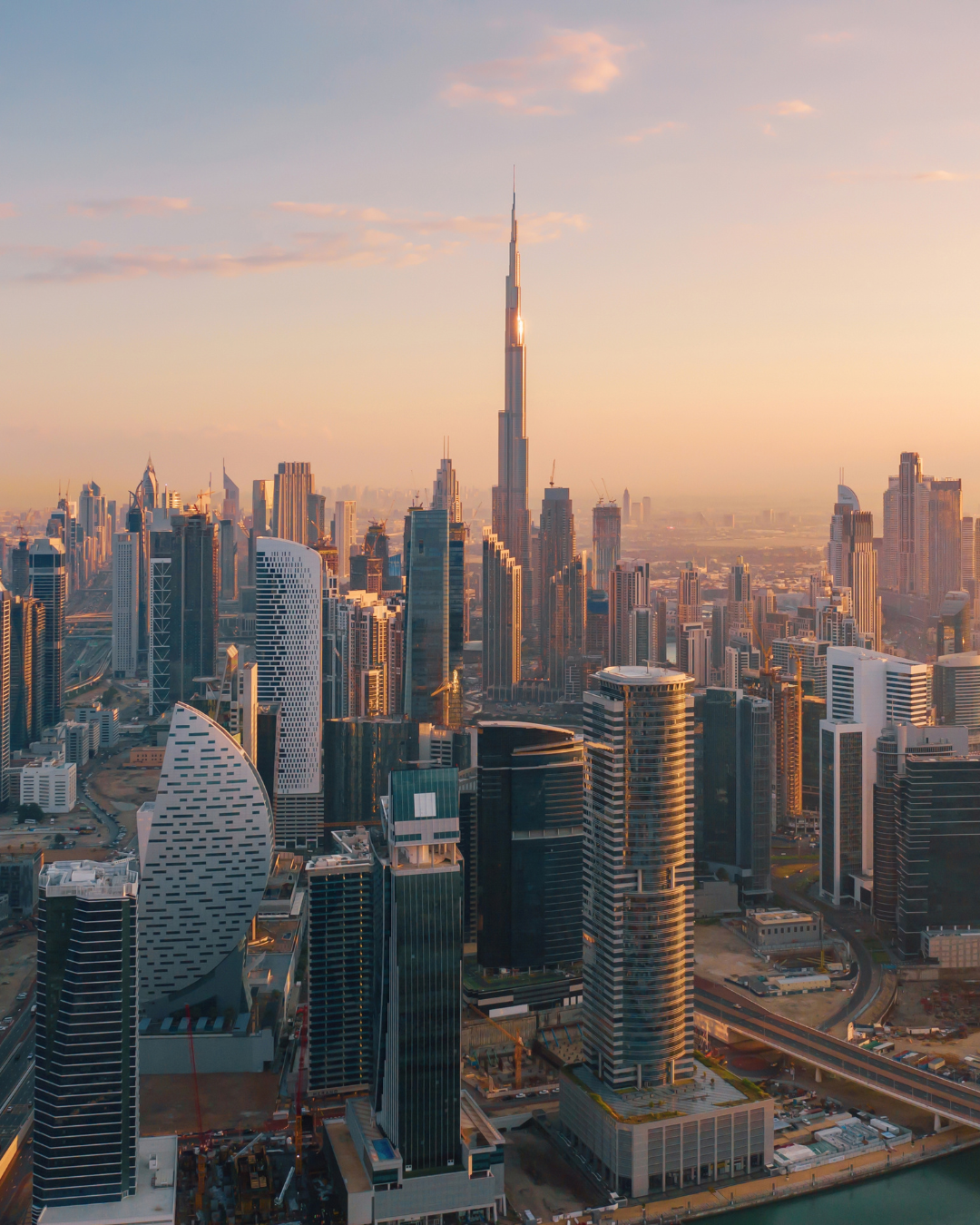 Dubai skyline with the Burj Khalifa at sunset